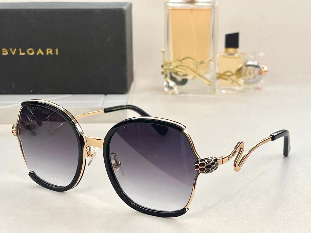 Black & Gold Oval Sunglasses with Jewel Side Detail
